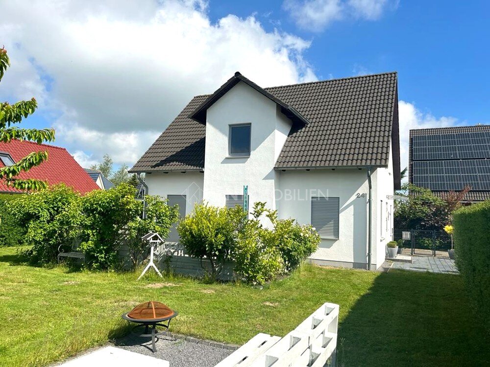 Einfamilienhaus zum Kauf 449.500 € 4 Zimmer 127 m²<br/>Wohnfläche 528 m²<br/>Grundstück Pastower Straße 24 Neu Broderstorf Broderstorf / Neu Broderstorf 18184