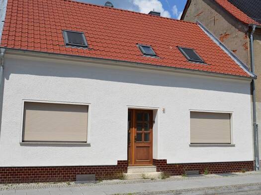 Reihenmittelhaus zum Kauf 79.000 € 6 Zimmer 110 m² 516 m² Grundstück frei ab sofort Lange Str. 36 Coswig Coswig (Anhalt) 06869