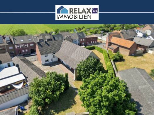 Haus zum Kauf 429.000 € 8 Zimmer 183 m² 1.801 m² Grundstück Rurich Hückelhoven 41836
