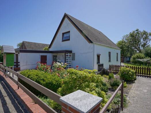 Einfamilienhaus zum Kauf 129.000 € 5 Zimmer 120 m² 597 m² Grundstück Misselwarden Wurster Nordseeküste 27639