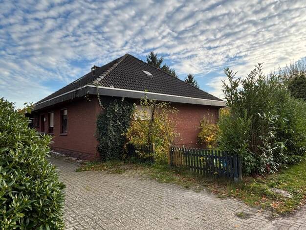Einfamilienhaus zum Kauf 199.000 € 7 Zimmer 152 m² 1.032 m² Grundstück Roggenmoor Apen 26689