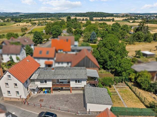 Einfamilienhaus zum Kauf 249.000 € 7 Zimmer 170 m² 561 m² Grundstück Burkhardsfelden Reiskirchen 35447