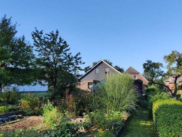 Einfamilienhaus zum Kauf 310.000 € 6 Zimmer 140 m² 1.485 m² Grundstück Wacken 25596