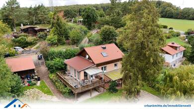 Einfamilienhaus zum Kauf 395.000 € 3 Zimmer 129 m² 1.182 m² Grundstück Hebenshausen Neu-Eichenberg 37249