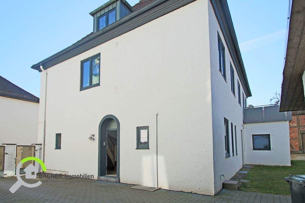 Immobilie in Lemförde - Vielseitiges Wohn- und Geschäftshaus mit Garten und Garage in zentraler Lage von Lemförde - Bild 2