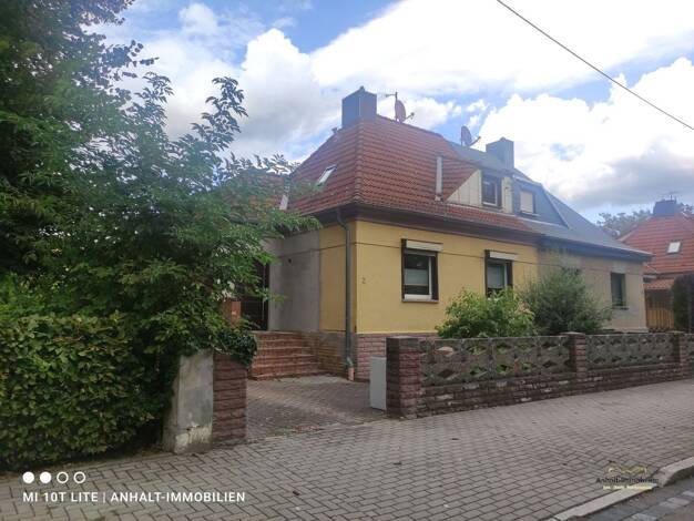 Doppelhaushälfte zum Kauf 180.000 € 5 Zimmer 97 m² 467 m² Grundstück Lindenstraße 3 Zscherndorf Sandersdorf 06792