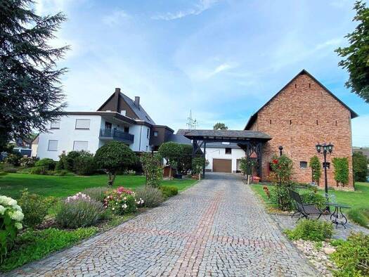 Mehrfamilienhaus zum Kauf 580.000 € 10 Zimmer 249 m² 1.985 m² Grundstück Katzenfurt Ehringshausen 35630