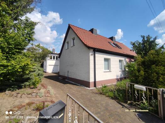 Doppelhaushälfte zum Kauf 180.000 € 6 Zimmer 132 m² 824 m² Grundstück frei ab sofort Karl-Liebknecht-Straße 36 Möhlau Gräfenhainichen 06772