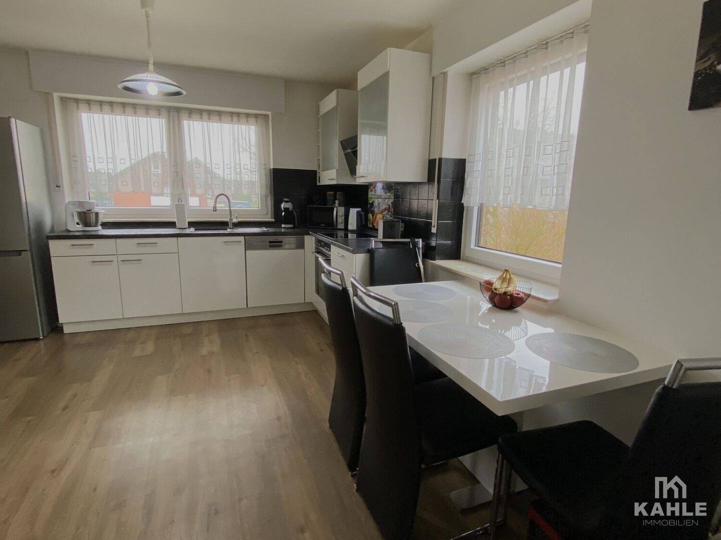 Immobilie in Sassenberg - Kaufobjekt: Attraktive 4-Zi.-Eigentumswohnung mit Balkon, Kaminofen und eigener Garage in Sassenberg - Bild 2