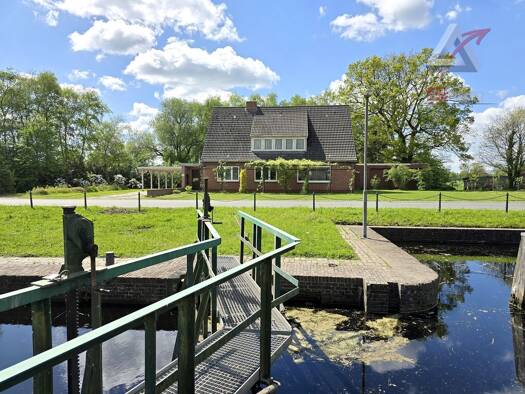 Einfamilienhaus zum Kauf 225.000 € 9 Zimmer 214 m² 2.855 m² Grundstück Nordgeorgsfehn Uplengen 26670