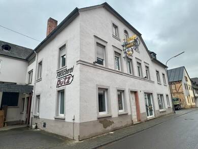 Einfamilienhaus zum Kauf 239.000 € 10 Zimmer 200 m² 538 m² Grundstück Osann-Monzel 54518