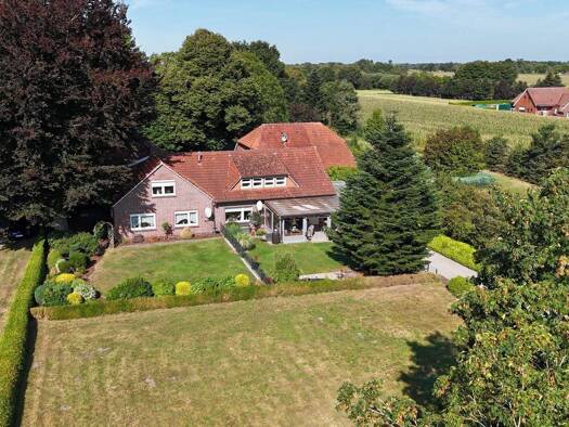 Mehrfamilienhaus zum Kauf 395.000 € 10 Zimmer 420 m² 5.500 m² Grundstück Holtland-Nücke Holtland 26835