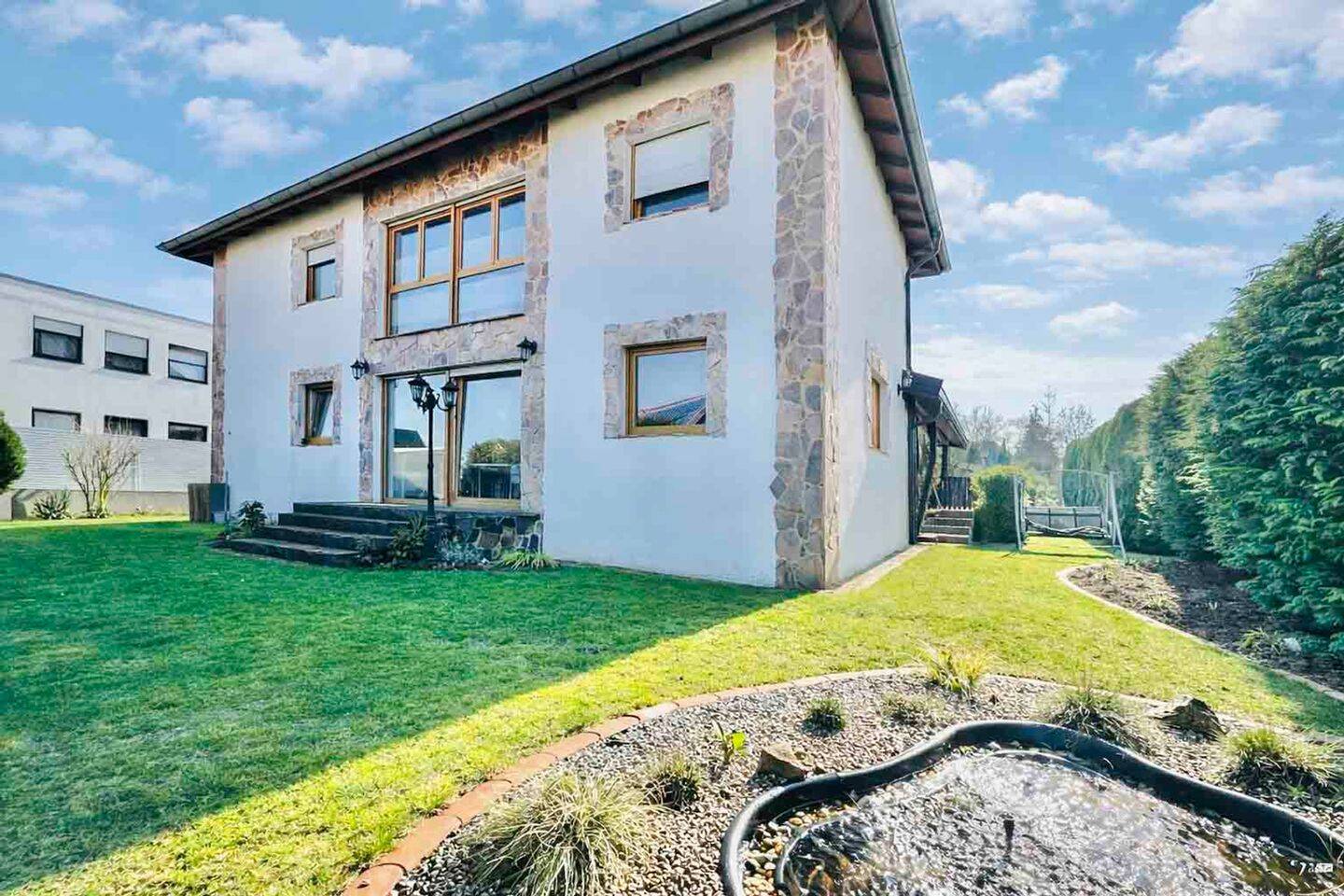 Immobilie in Holle - Charmantes Holzhaus trifft modernen Neubau - Ruhige Sackgassenlage in Holle - Erbpacht - Bild 0