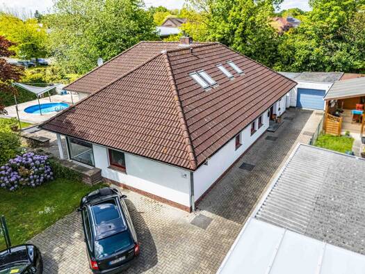 Einfamilienhaus zum Kauf 369.000 € 5 Zimmer 225 m² 1.069 m² Grundstück Haxtum Aurich 26605