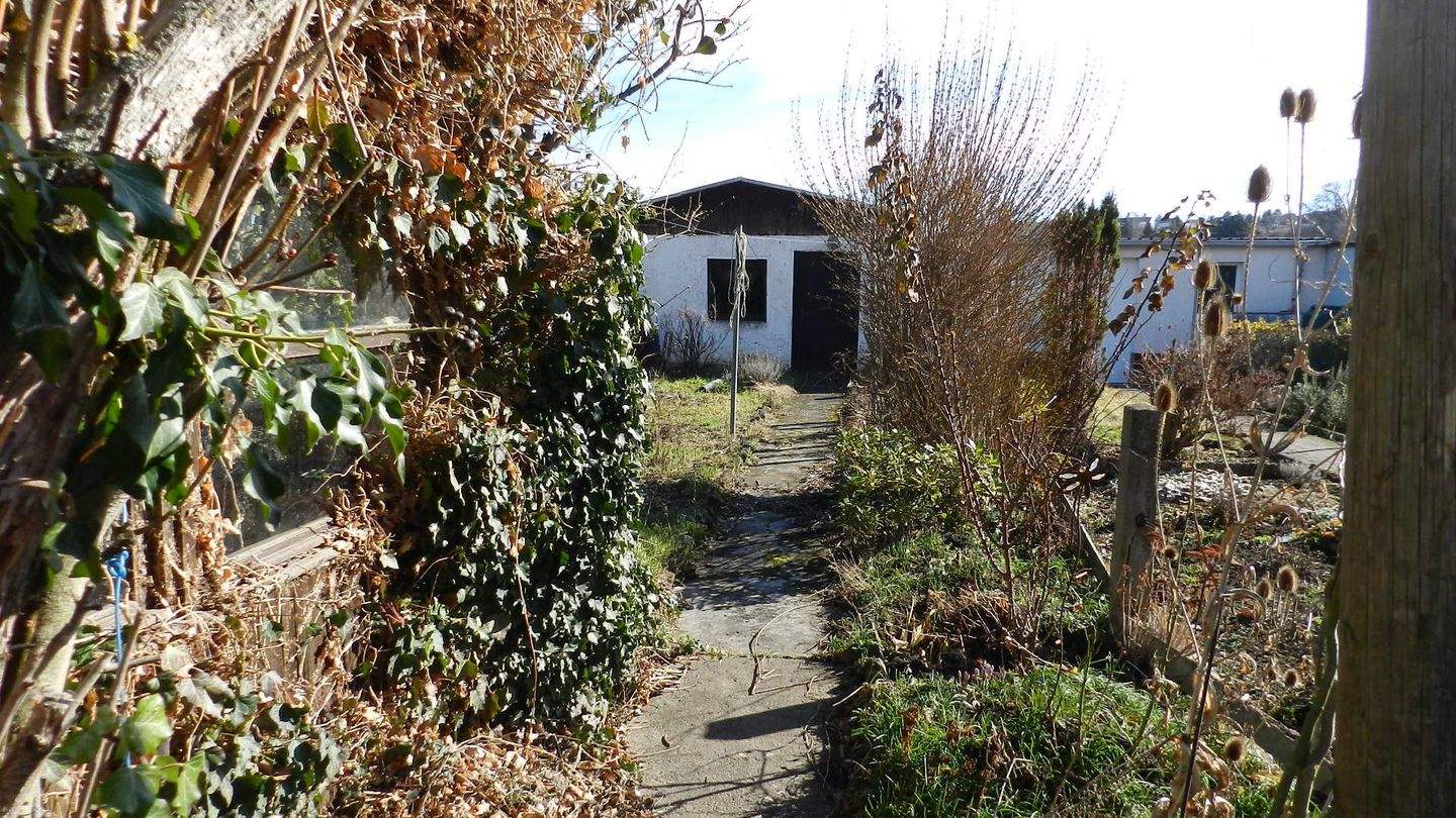 Immobilie in Unterwellenborn - Reihenmittelhaus mit Garage und Nebengelass zu verkaufen - Bild 2