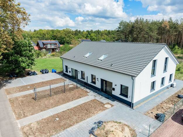 Doppelhaushälfte zum Kauf - Erstbezug 345.000 € 5,5 Zimmer 140 m² 490 m² Grundstück Poitzen Faßberg 29328