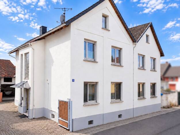 Mehrfamilienhaus zum Kauf als Kapitalanlage geeignet 375.000 € 8 Zimmer 160 m² 340 m² Grundstück Nieder-Mörlen Bad Nauheim 61231