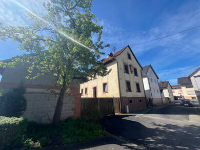 Einfamilienhaus zum Kauf 89.000 € 5 Zimmer 157 m² 1.067 m² Grundstück Karsbach Karsbach 97783