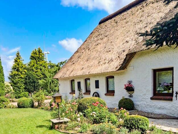 Haus zum Kauf 375.000 € 7 Zimmer 122 m² 4.566 m² Grundstück Tetenhusen 24817