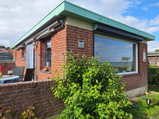 Ferienhaus zum Kauf 295.000 € 2,5 Zimmer 37 m² 220 m² Grundstück frei ab sofort Am Strande Sierksdorf Sierksdorf 23730