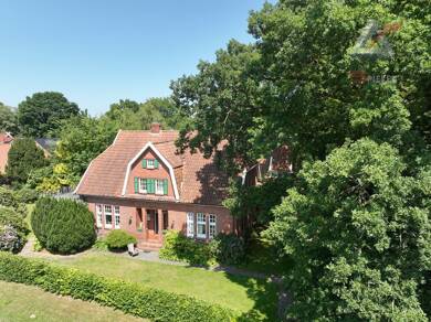 Einfamilienhaus zum Kauf 425.000 € 9 Zimmer 325 m² 2.621 m² Grundstück Remels Uplengen / Remels 26670