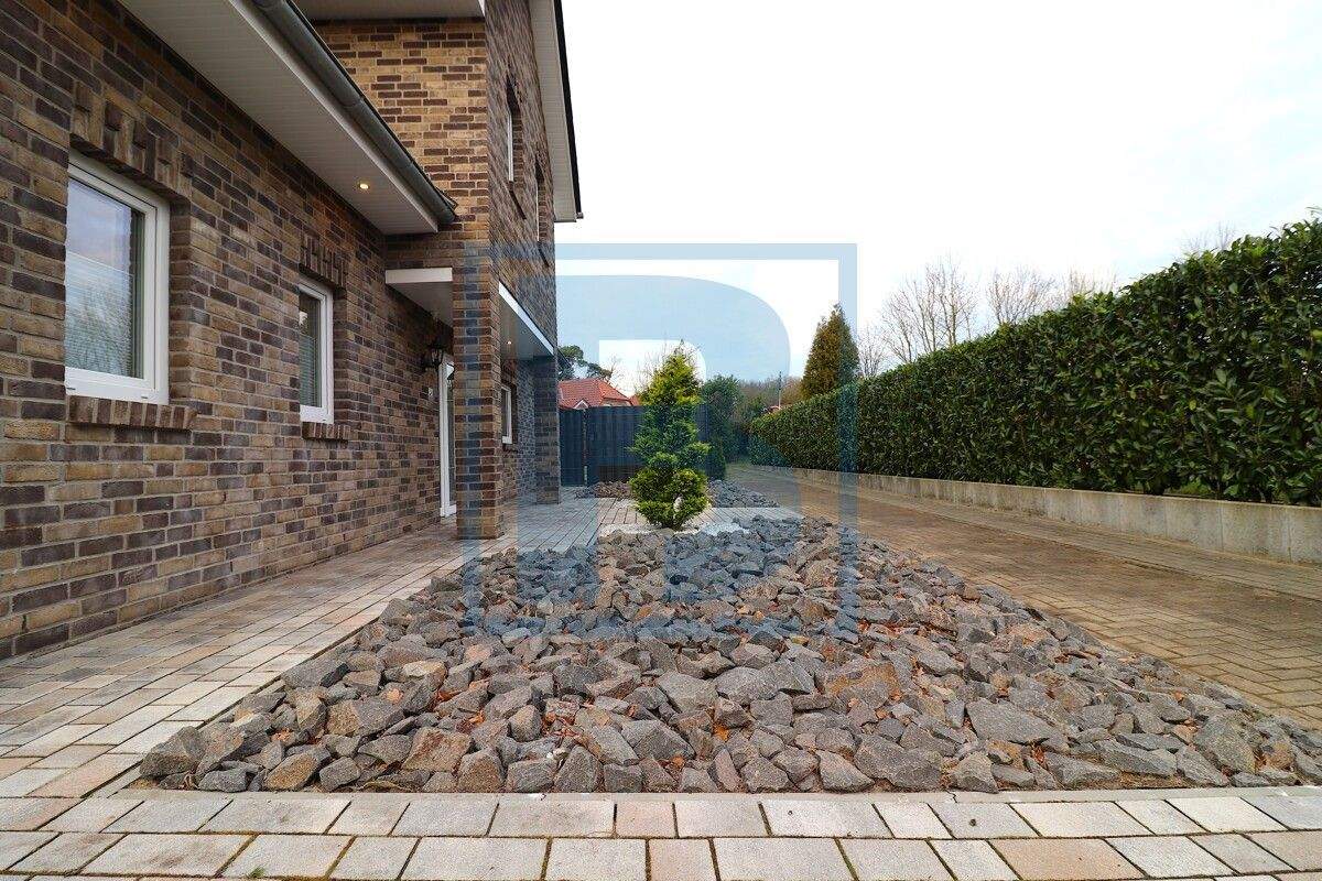 Immobilie in Löningen - Exklusives Einfamilienhaus in Top Wohnlage mit Garage und Terassenüberdachung - Bild 2