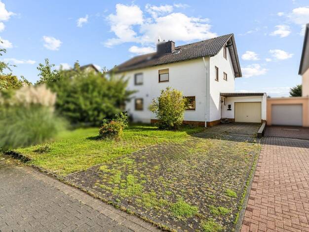 Doppelhaushälfte zum Kauf 449.000 € 7 Zimmer 150 m² 421 m² Grundstück Butzbach 35510