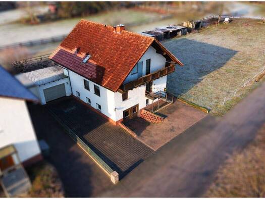 Einfamilienhaus zum Kauf 269.000 € 5 Zimmer 140 m² 2.385 m² Grundstück Weitershain 35305