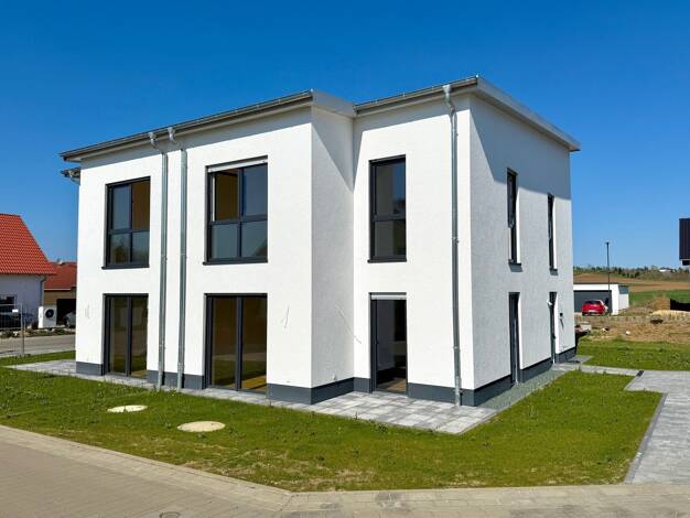 Doppelhaushälfte zum Kauf - Erstbezug 449.000 € 4 Zimmer 106 m² 250 m² Grundstück frei ab sofort Muschenheim Lich 35423