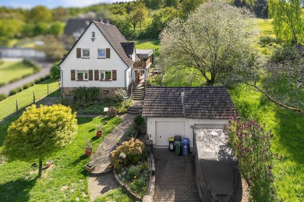 Einfamilienhaus zum Kauf 339.000 € 4 Zimmer 135 m² 1.326 m² Grundstück Queckborn Grünberg 35305