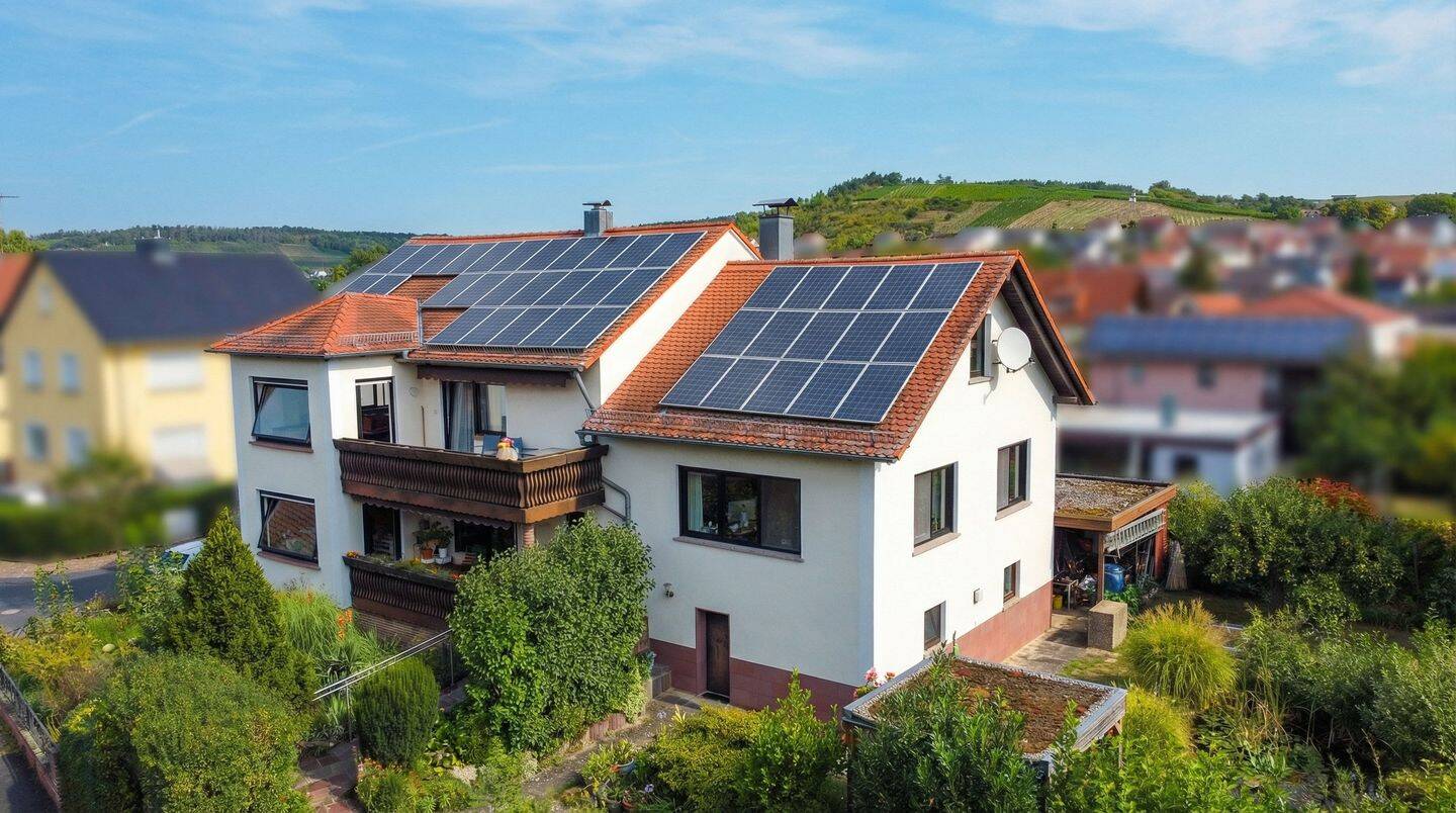 Immobilie in Erlenbach b.Marktheidenfeld - Ein Haus, viele Möglichkeiten: Komfortables Wohnen mit schönem Garten - Bild 2