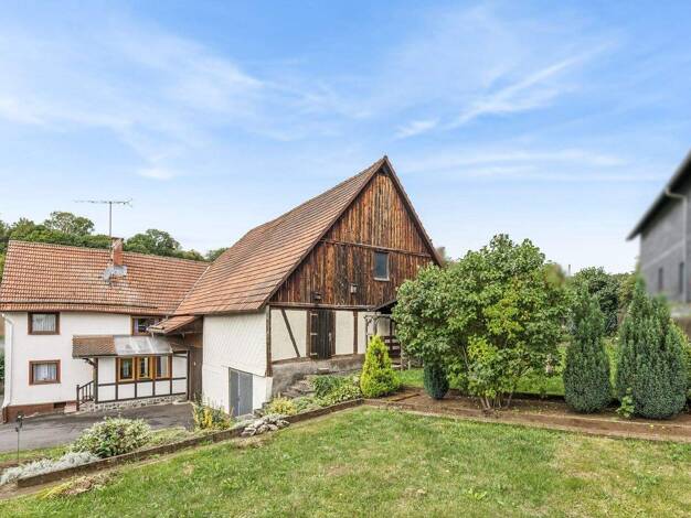 Einfamilienhaus zum Kauf 265.000 € 7 Zimmer 205 m² 670 m² Grundstück Rudingshain Schotten 63679