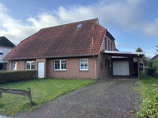 Doppelhaushälfte zum Kauf 199.000 € 4 Zimmer 109 m² 365 m² Grundstück Marienhafe 26529