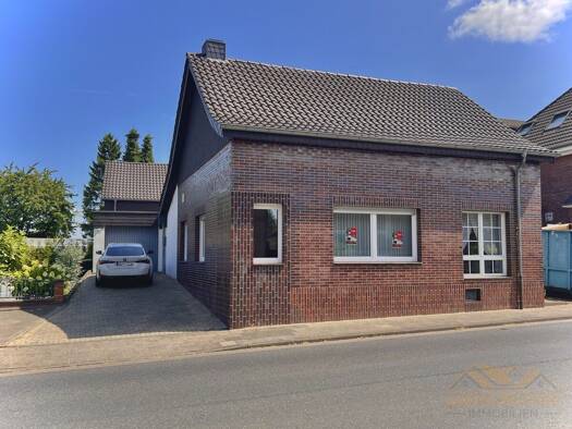 Einfamilienhaus zum Kauf 300.000 € 6 Zimmer 200 m² 958 m² Grundstück Wildenrath Wegberg 41844