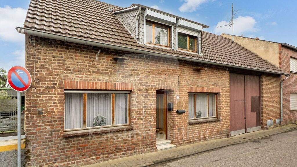 Immobilie in Bedburg - Charmantes Einfamilienhaus mit Innenhof und großem Garten! - Bild 0