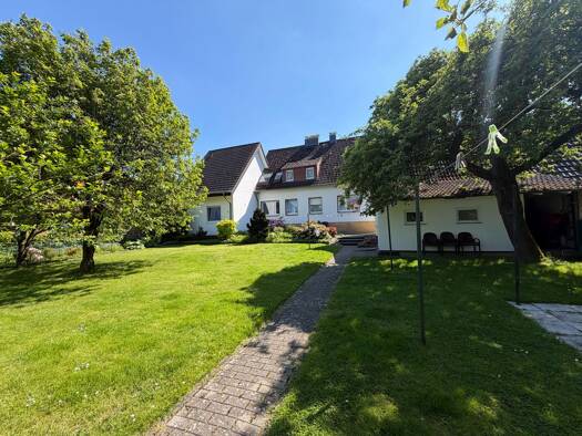 Mehrfamilienhaus zum Kauf 417.000 € 8 Zimmer 200,8 m² 1.087 m² Grundstück frei ab sofort Hasbergen Hasbergen 49205