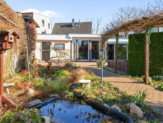 Einfamilienhaus zum Kauf 349.000 € 5,5 Zimmer 196,3 m² 1.210 m² Grundstück Tungendorf Neumünster 24536