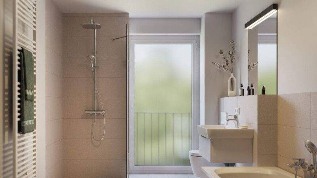 Stilvolle Neubauwohnung am Kurpark: Geräumige 3 Zimmer mit Tageslichtbad und Südbalkon