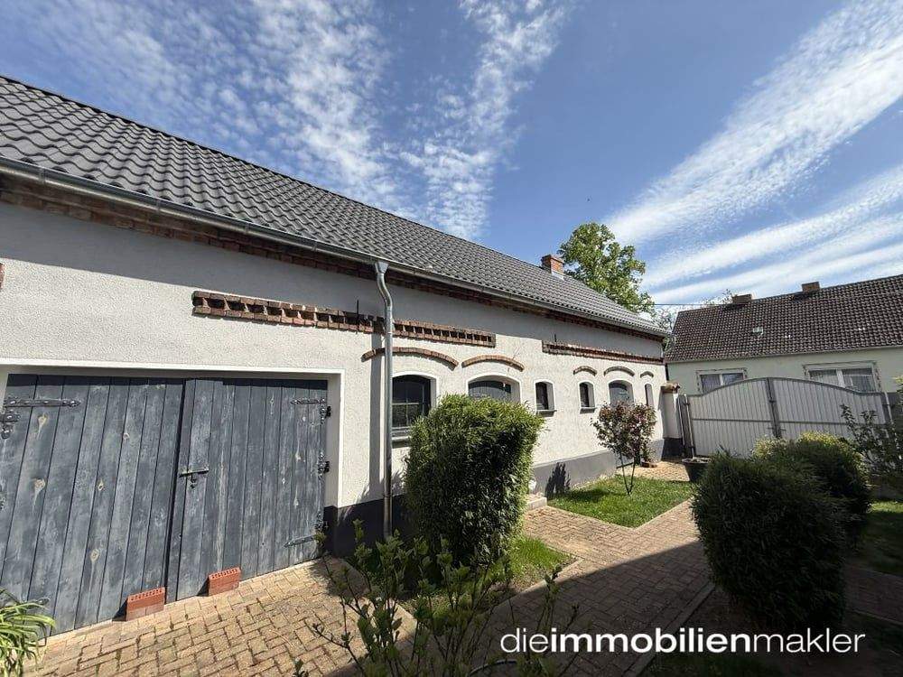 Immobilie in Heideblick - 2 Häuser: liebevoll saniertes Bauernhaus & Town u. Country Bungalow + Backsteinscheune - Bild 4