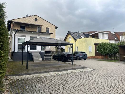 Mehrfamilienhaus zum Kauf 599.000 € 12 Zimmer 295 m² 1.215 m² Grundstück Hungen 35410