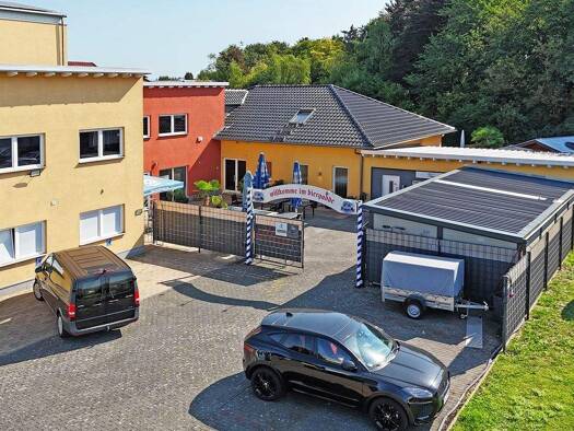 Mehrfamilienhaus zum Kauf 990.000 € 20 Zimmer 518 m² 1.400 m² Grundstück Wölfersheim 61200