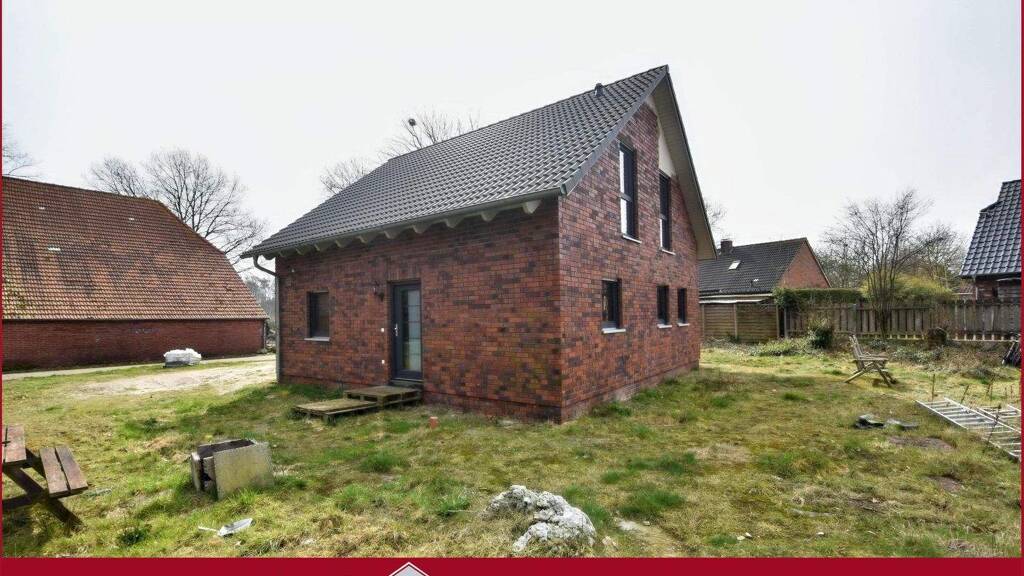 Einfamilienhaus zum Kauf 329.000 € 5 Zimmer 130 m² 904 m² Grundstück Strackholt Großefehn 26629