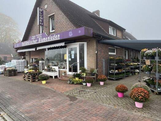 Mehrfamilienhaus zum Kauf 449.000 € 9 Zimmer 320 m² 1.723 m² Grundstück Holterfehn Ostrhauderfehn 26842