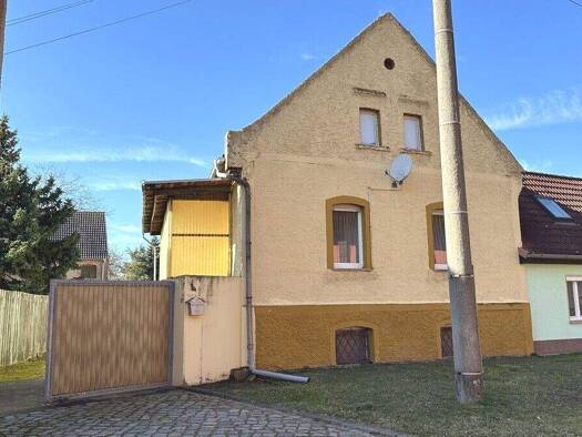 Doppelhaushälfte zum Kauf 79.000 € 2 Zimmer 78 m² 1.361 m² Grundstück Großzöberitz 06780