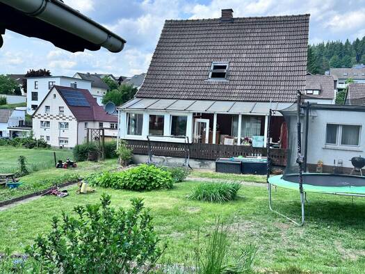 Einfamilienhaus zum Kauf 149.500 € 675 m² Grundstück Breidenbach 35236