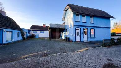 Wohn- und Geschäftshaus zum Kauf als Kapitalanlage geeignet 249.000 € 5 Zimmer 89 m² 848 m² Grundstück Wankendorf 24601