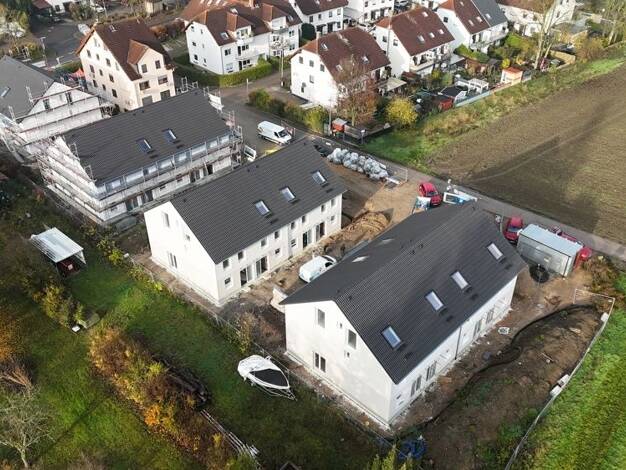 Reihenendhaus zum Kauf - Erstbezug 549.900 € 5,5 Zimmer 137 m² 220 m² Grundstück Gau-Bischofsheim 55296