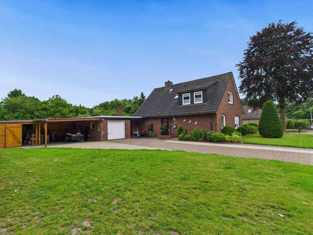 Einfamilienhaus zum Kauf 259.000 € 7 Zimmer 138,9 m² 831 m² Grundstück Wittmund 26409