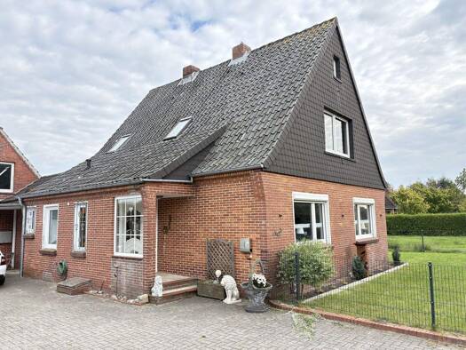 Einfamilienhaus zum Kauf 240.000 € 5 Zimmer 142 m² 1.185 m² Grundstück Leezdorf 26529