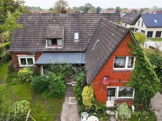 Einfamilienhaus zum Kauf 149.500 € 9 Zimmer 145 m² 1.895 m² Grundstück Veenhusen Moormerland 26802